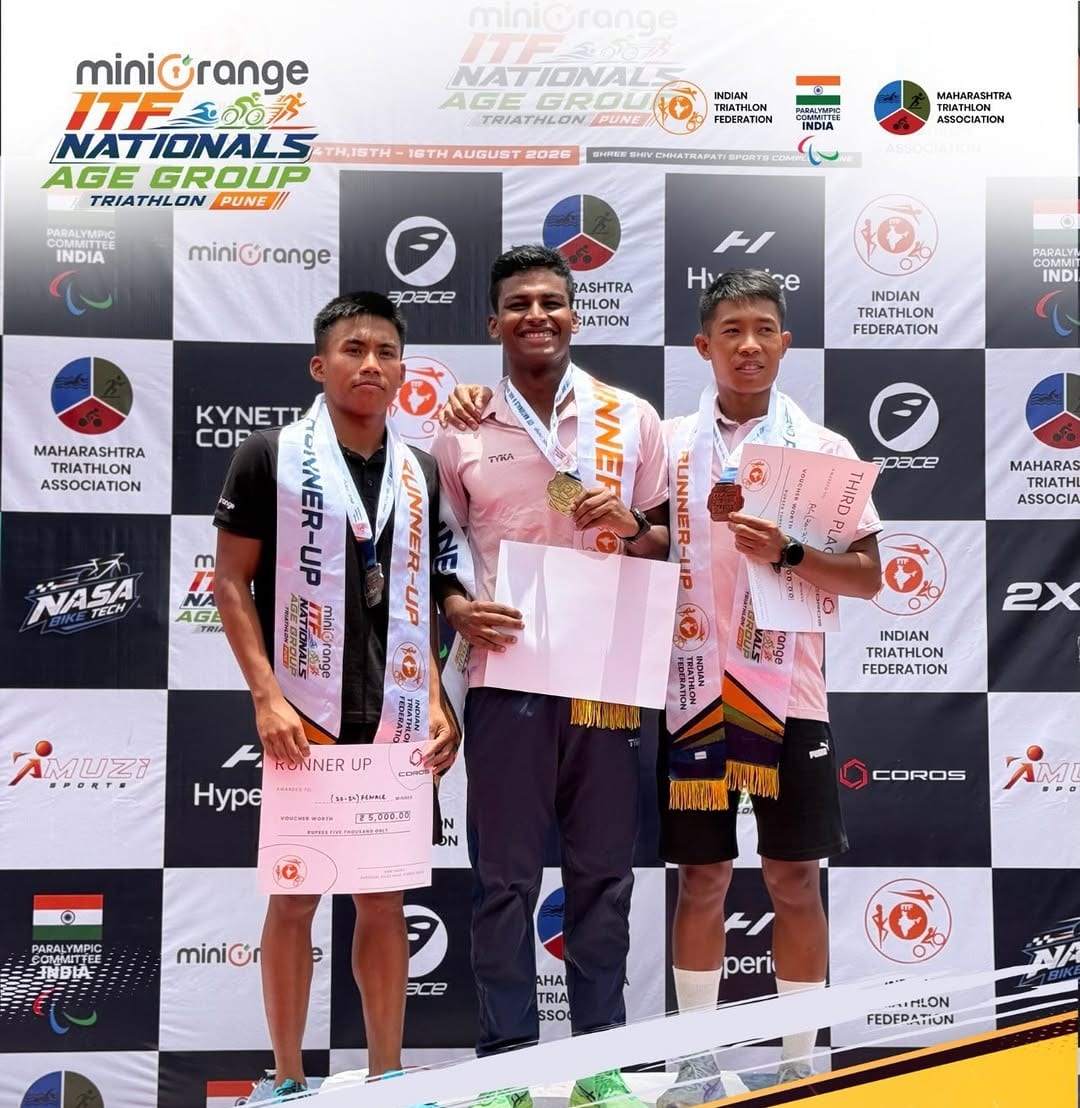 Three male age-group triathletes on the podium at the ITF Nationals in Pune, medals and certificates in hand